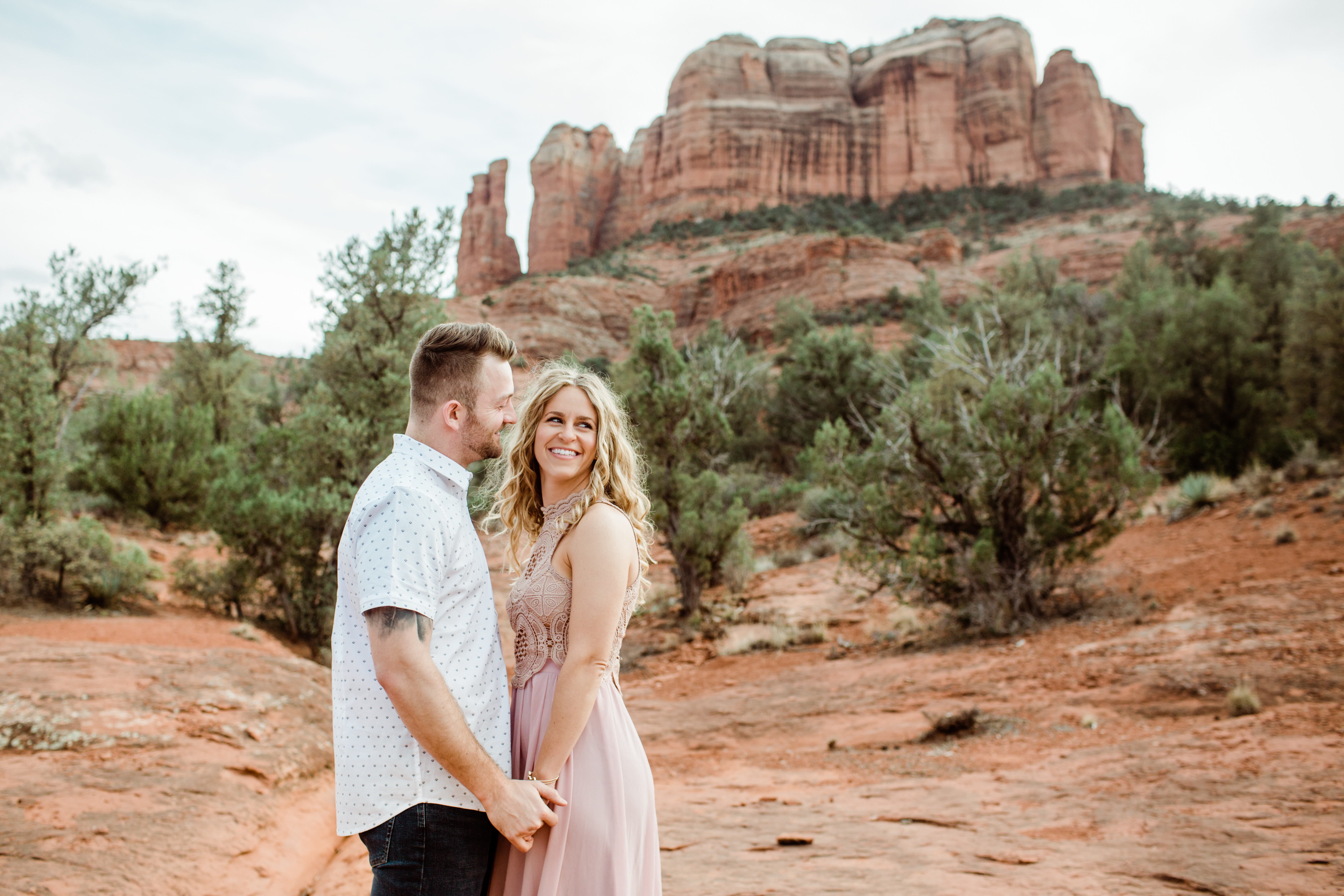 engaged-couple-laughing-cathedral-rock