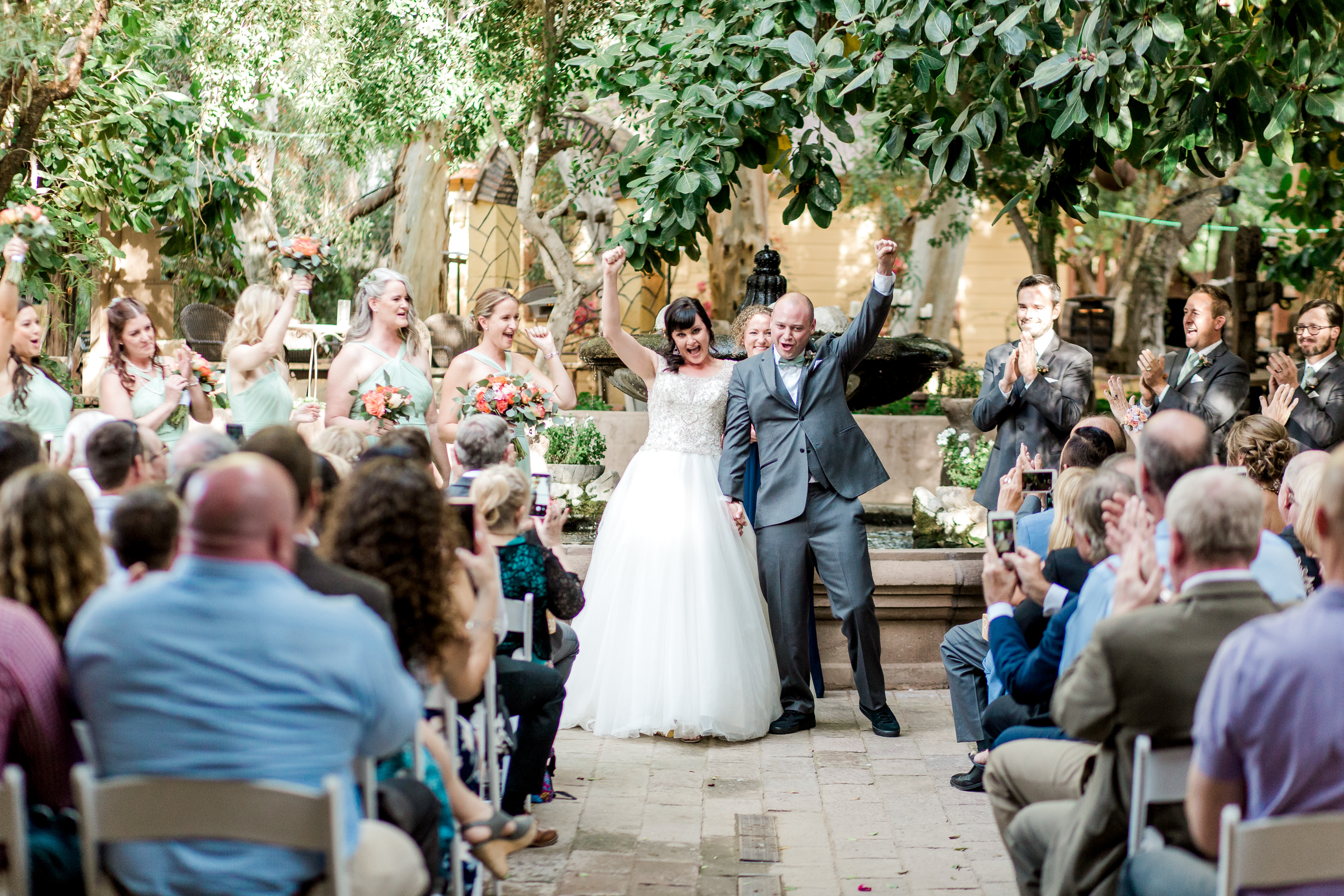 bride-groom-celebrating-just-married-boojum-tree-wedding-phoenix-arizona