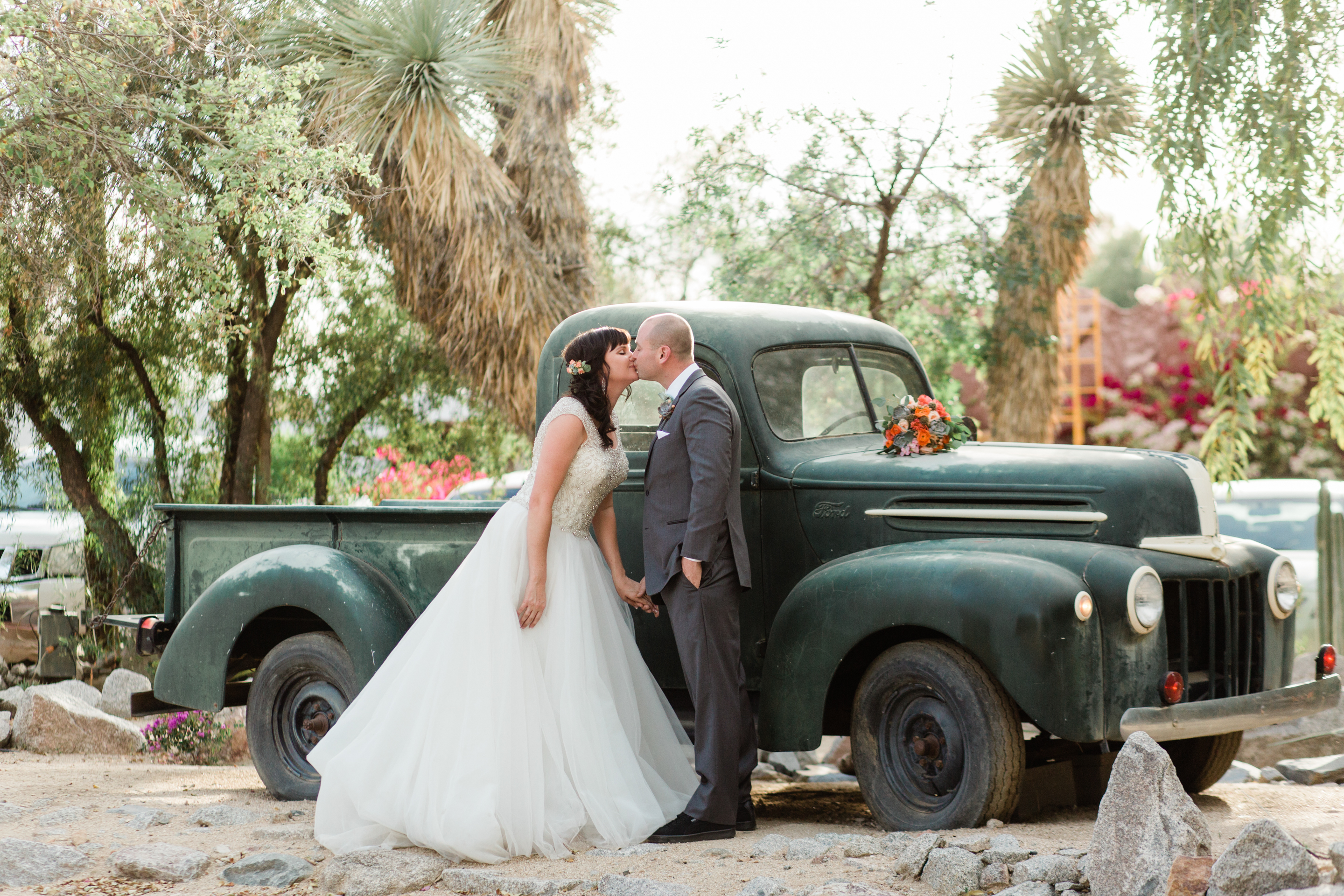 bride-groom-kissing-old-truck-boojum-tree