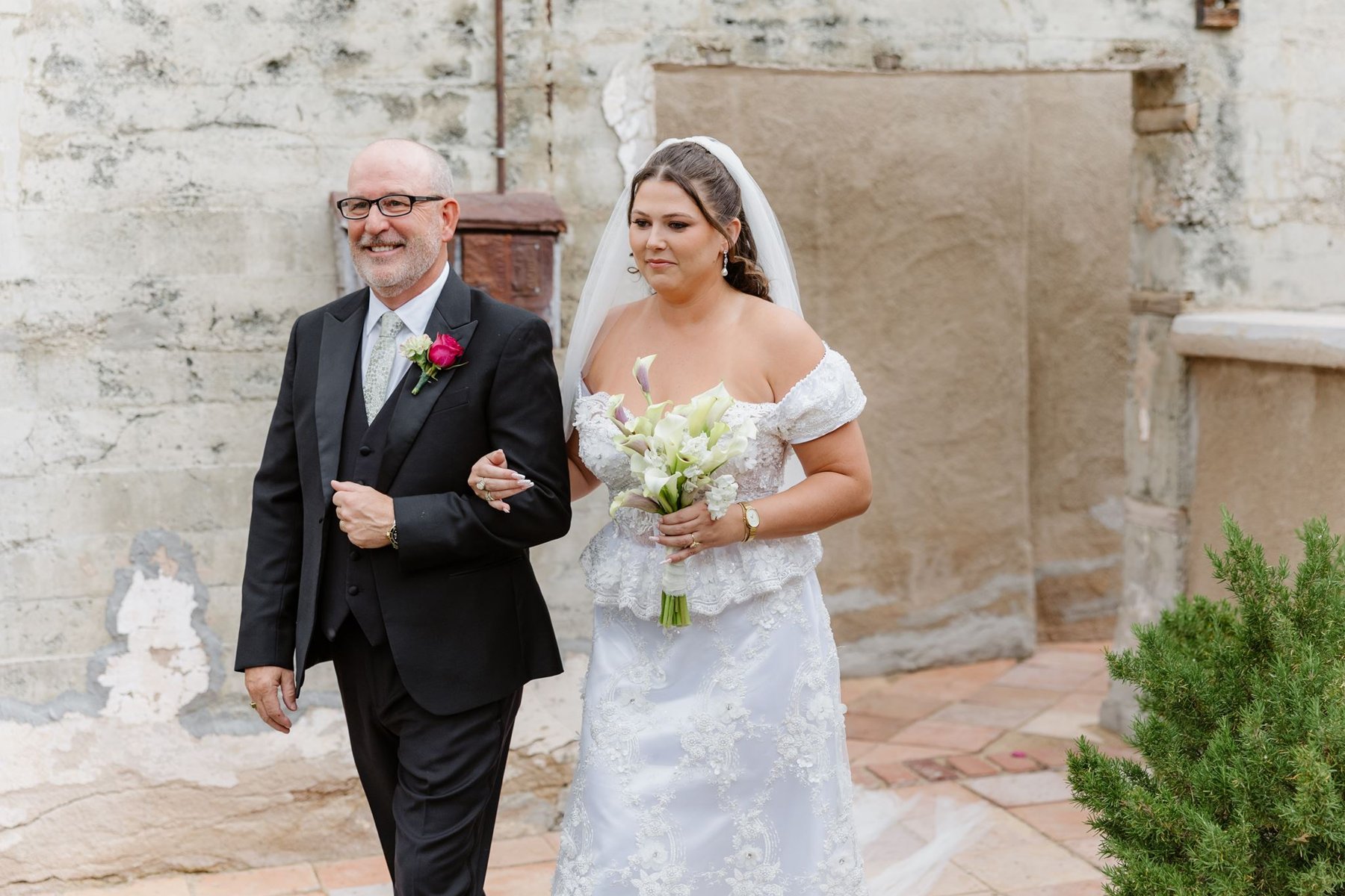 Abigail walking down the aisle with her father