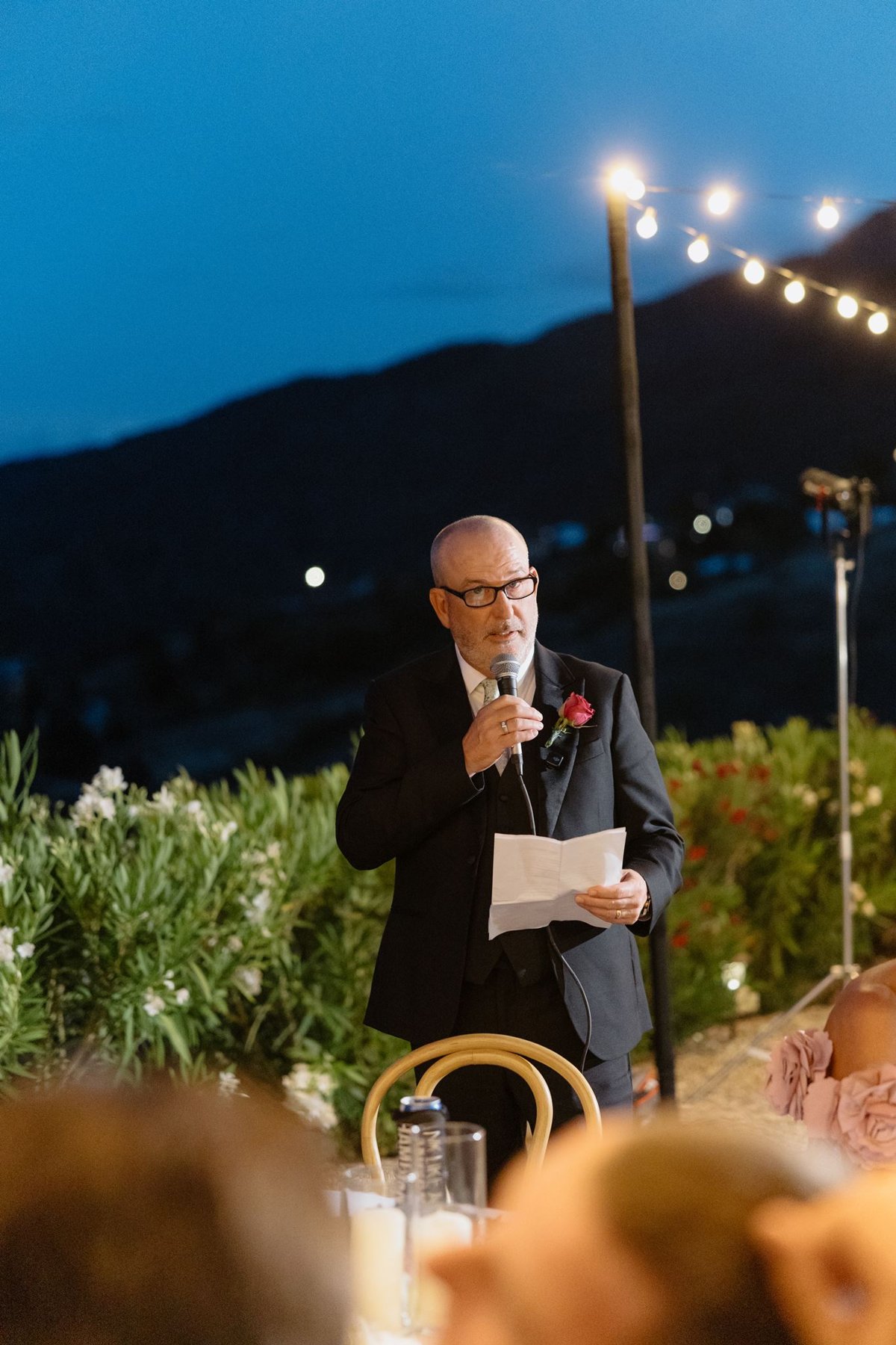 Abigail’s father giving a wedding speech as the sky turns blue